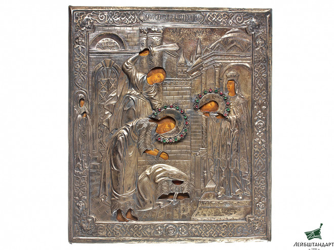 Икона, изображающая усекновения главы Св.Иоанна Предтечи, в серебряном окладе.